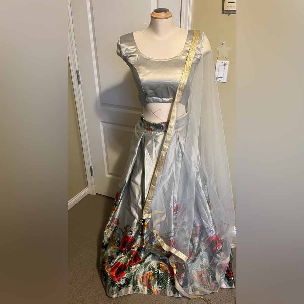 Floral printed lengha with blouse and dupatta.